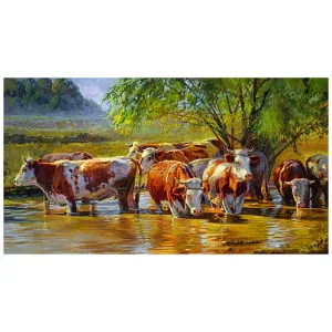 Roodbont vee onder wilg