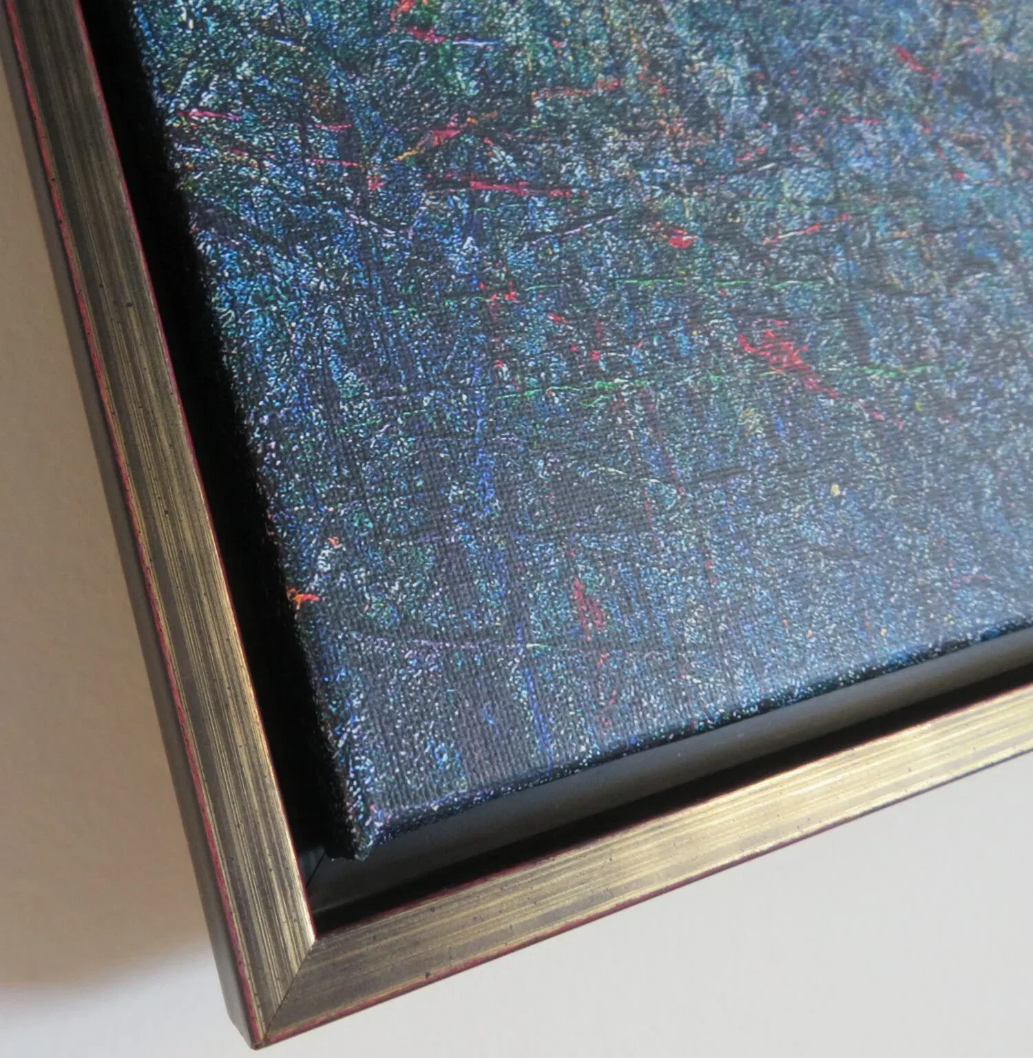 een close-up van een schilderij aan de muur