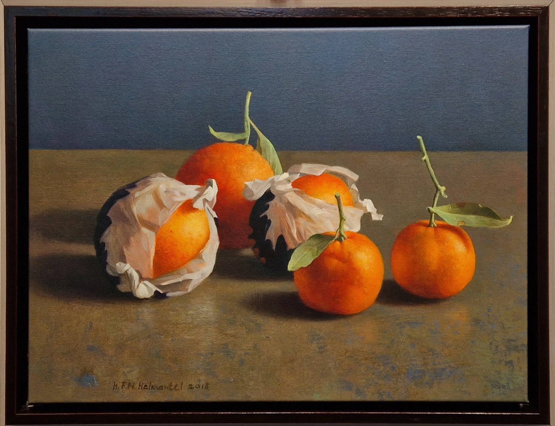 een schilderij van drie sinaasappels op een tafel