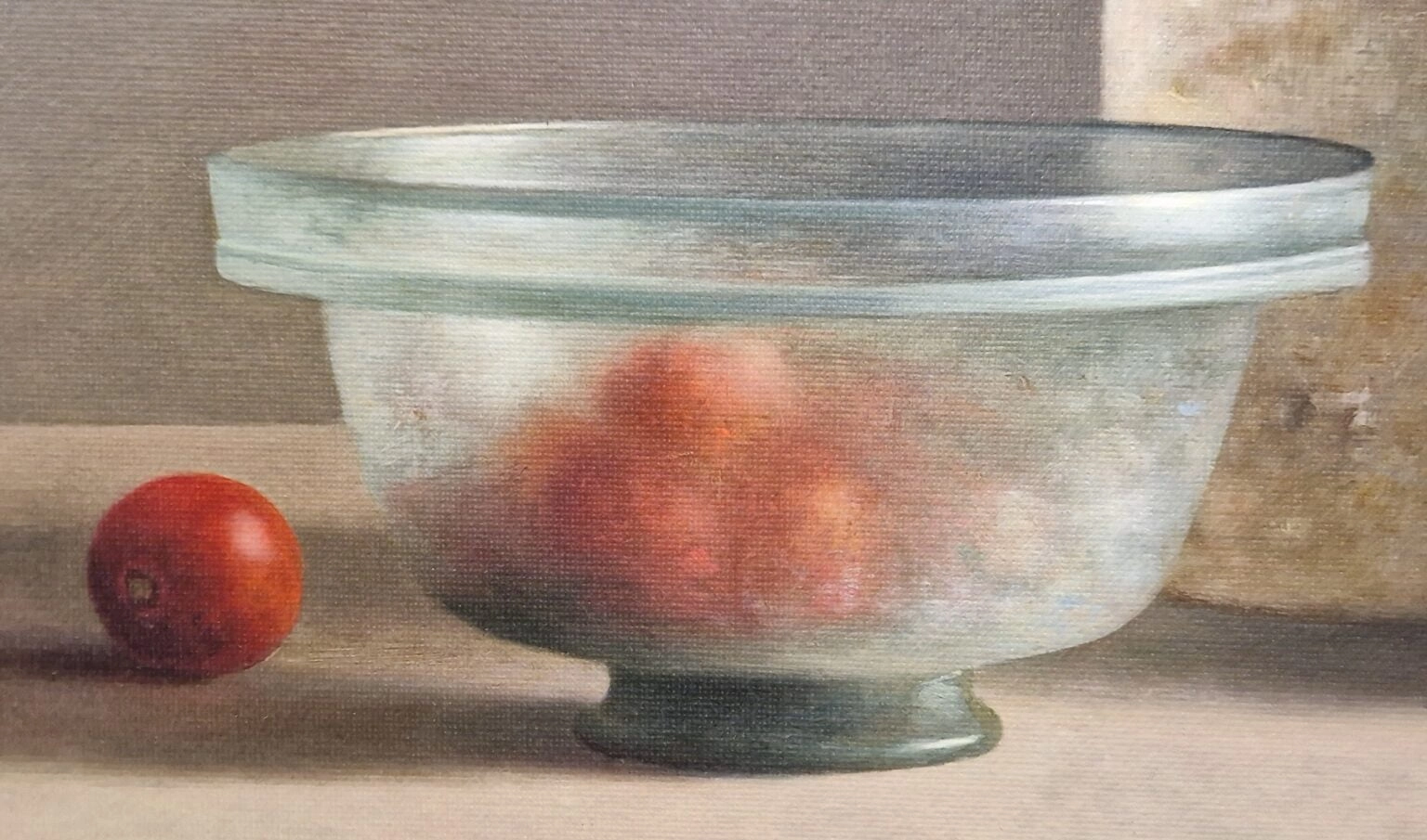 een schilderij van een kom met twee appels erin